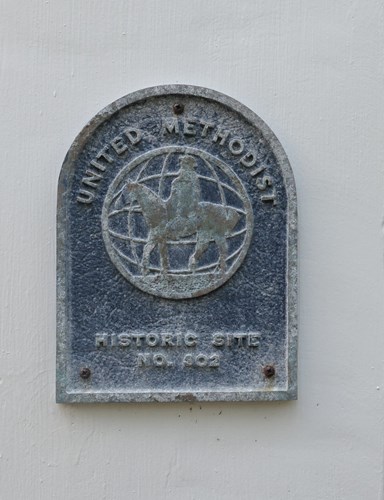 United Methodist Historic Site No. 302 marker by Pisgah Church front doors. Pisgah United Methodist Church was added to the National Register of Historic Places on May 3, 1974. Image, 2023 Courtesy of Russell Brasel