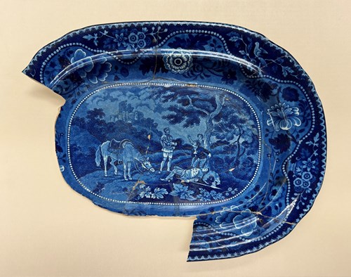 Knight of the Wood platter, blue transferware, ca. 1835 Artifact courtesy the Bureau of Archaeological Research