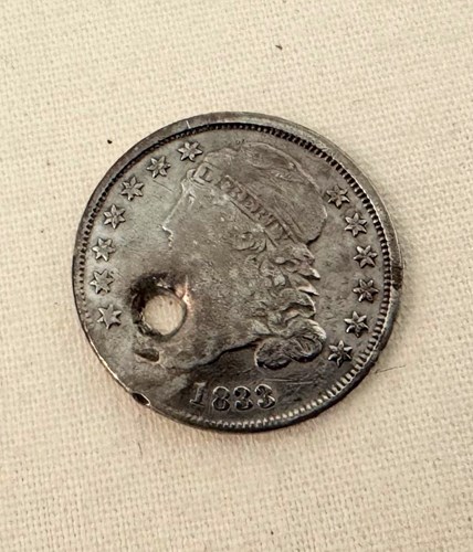 1833 US Capped Bust Dime (heads), excavated from the Florida Capitol Complex  Artifact courtesy of the Bureau of Archeological Research