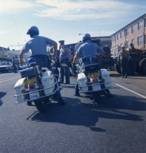 A motorcycle police escort accompanies the Union Bank building on its two-day move from Adams Street to the Apalachee Parkway. Courtesy of the Museum of Florida History.