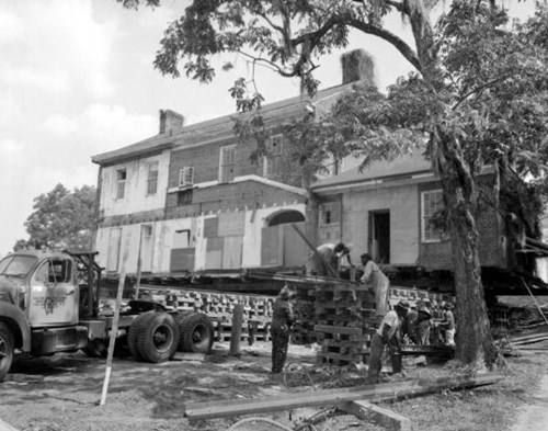 Men prepare The Columns, and historic home, to move the building to its current location on Duval Street. Courtesy of the State Archives of Florida.