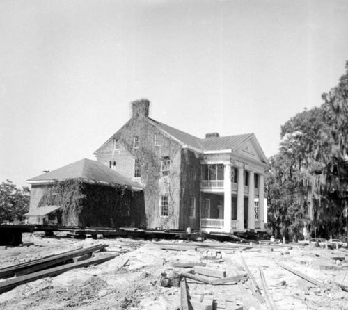 To prepare for the move, it required six weeks to raise the home off its foundations.  Courtesy of the State Archives of Florida.